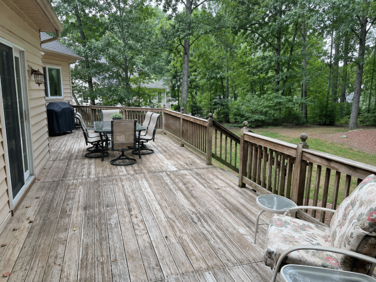 Before Lake Norman deck renovation showing weathered decking and faded railings
