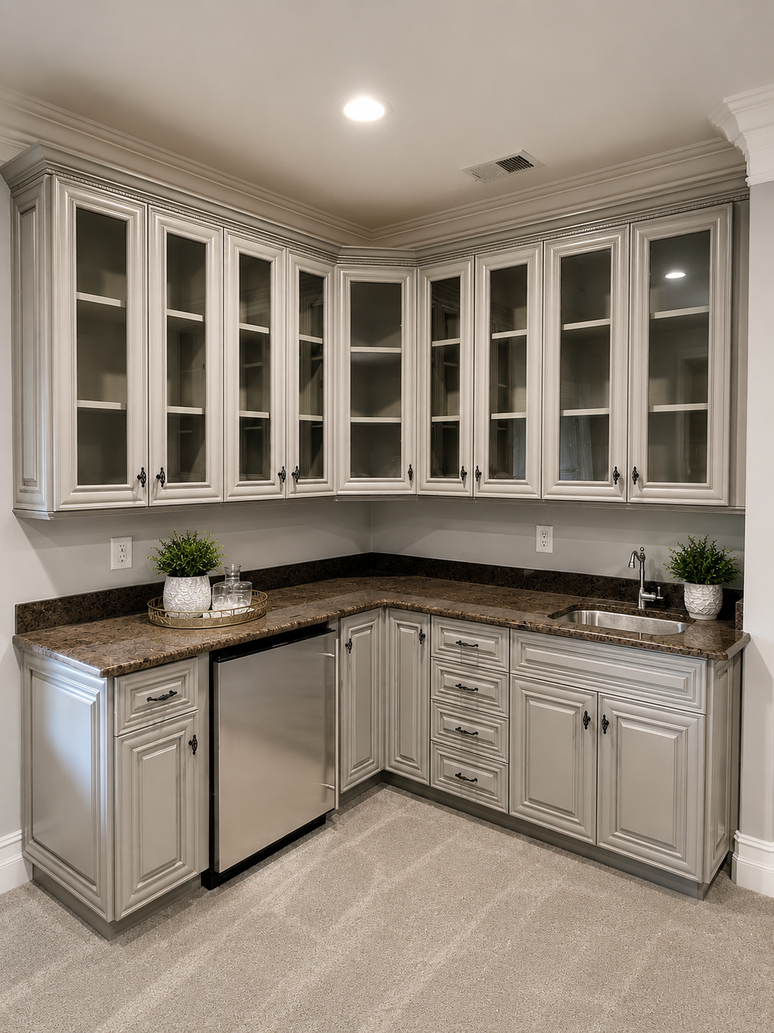 After wet bar cabinet refinishing in Ballantyne with light painted cabinetry and updated look