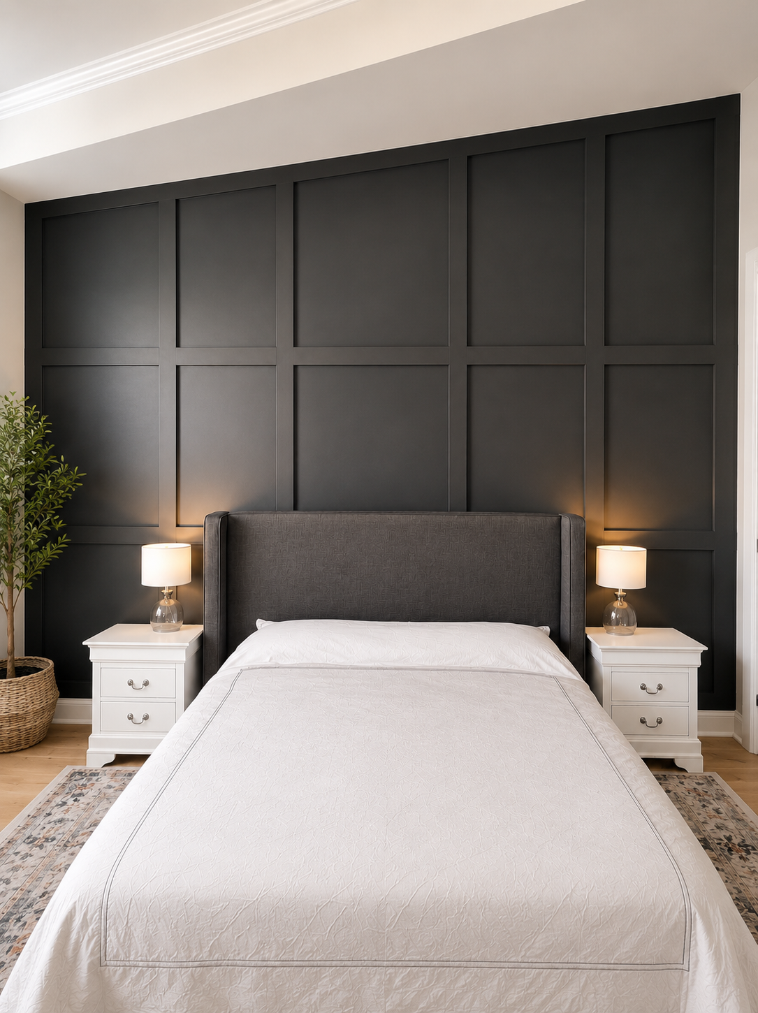 After interior house painting in Charlotte with a bold dark accent wall and refreshed paneling