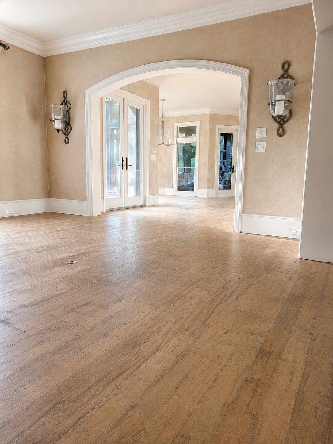 Before photo of worn hardwood floors in Weddington NC home prior to refinishing and painting